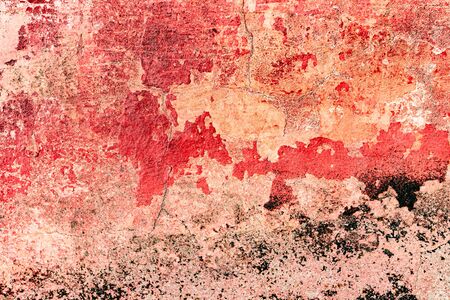 Texture of a concrete wall with cracks and scratches which can be used as a background