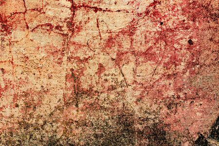 Texture of a concrete wall with cracks and scratches which can be used as a background