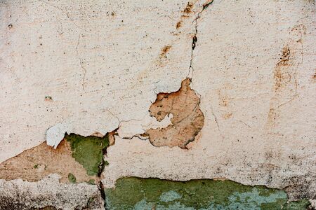 Texture of a concrete wall with cracks and scratches which can be used as a background
