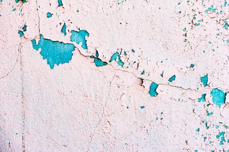 Texture of a concrete wall with cracks and scratches which can be used as a background