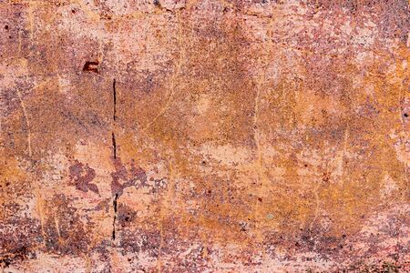 Texture of a concrete wall with cracks and scratches which can be used as a background