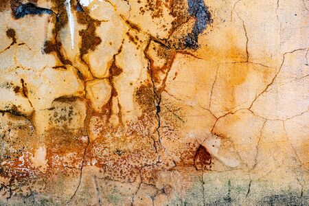 Texture of a concrete wall with cracks and scratches which can be used as a background