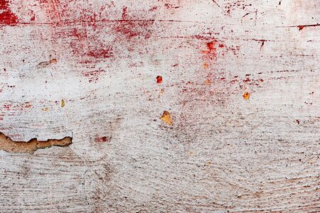 Texture of a concrete wall with cracks and scratches which can be used as a background