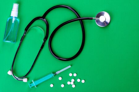 Medical supplies on a colored background as an attribute of the fight against coronavirus. World-wide pandemic, protectionの写真素材