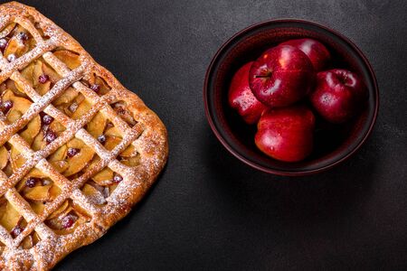 Delicious fresh pie baked with apple, pears and berries. Fresh pastries for delicious breakfastの写真素材