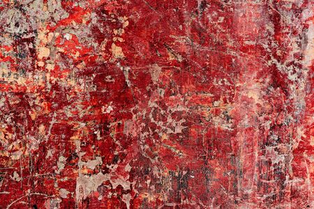 Texture of a concrete wall with cracks and scratches which can be used as a backgroundの写真素材