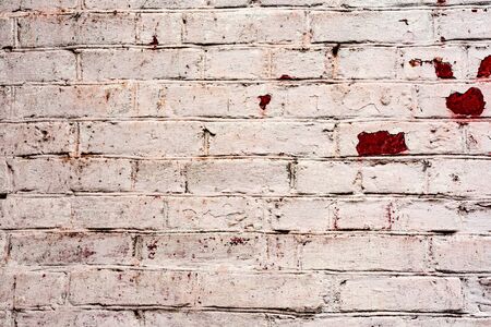 Texture, brick, wall, it can be used as a background. Brick texture with scratches and cracks