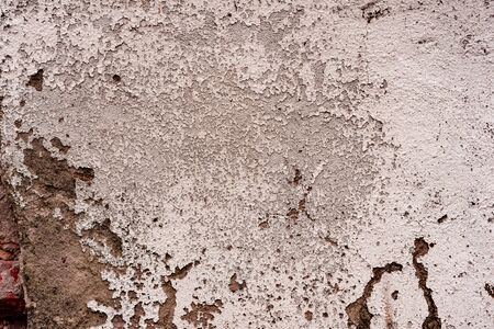 Texture, wall, concrete, it can be used as a background. Wall fragment with scratches and cracks
