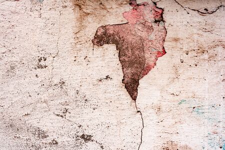 Texture, wall, concrete, it can be used as a background. Wall fragment with scratches and cracks