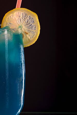 Refreshing cool blue curacao on the bar counter. Cocktail at a party. Evening stay in the barの写真素材