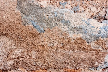 Texture, wall, concrete, it can be used as a background. Wall fragment with scratches and cracks