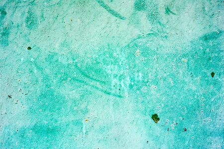 Texture of a metal wall with cracks and scratches which can be used as a backgroundの写真素材