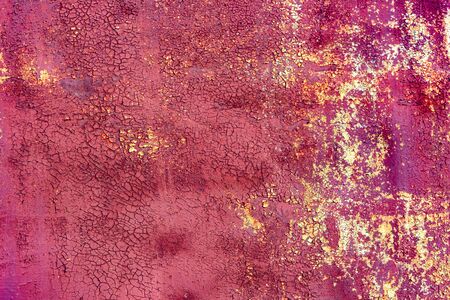 Texture of a metal wall with cracks and scratches which can be used as a background