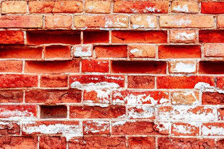 Texture, brick, wall, it can be used as a background. Brick texture with scratches and cracksの写真素材