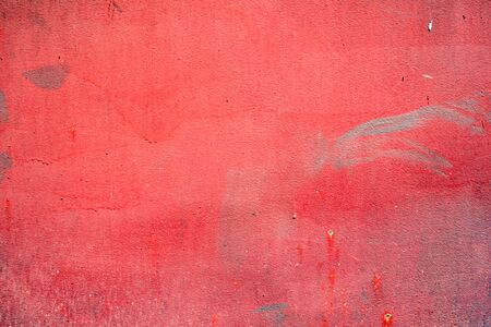Texture of a metal wall with cracks and scratches which can be used as a backgroundの写真素材