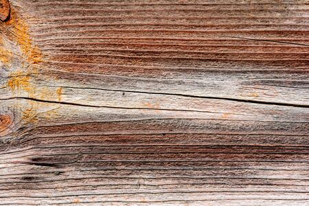 Wooden texture with scratches and cracks. It can be used as a background. Old grunge dark textured...