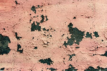 Pink cement wall texture for background and design art work. Old grunge crack pink concrete wall...