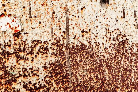 Texture of a metal wall with cracks and scratches which can be used as a background