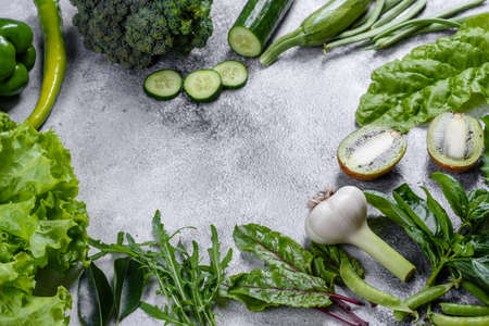 Flat lay series of assorted green toned vegetables, fresh organic raw produceの写真素材