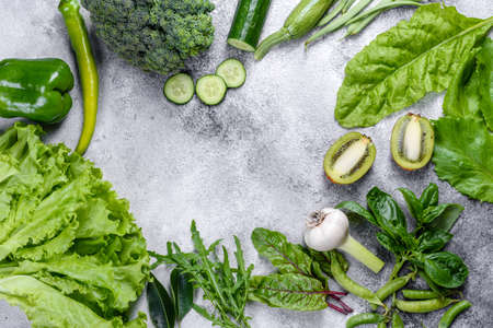 Flat lay series of assorted green toned vegetables, fresh organic raw produceの写真素材