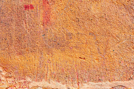 Texture, wall, concrete, it can be used as a background. Wall fragment with scratches and cracks