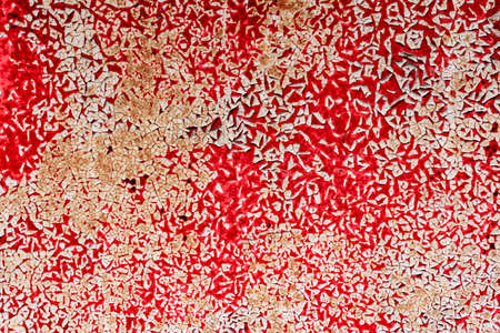 Texture of a metal wall with cracks and scratches which can be used as a backgroundの写真素材