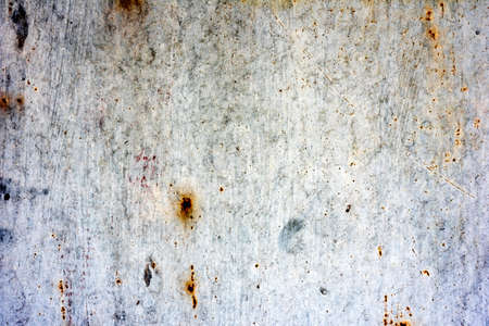 Texture of a metal wall with cracks and scratches which can be used as a background