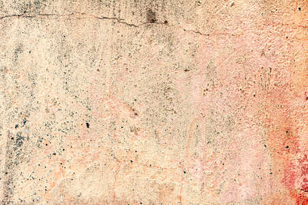 Old grunge crack pink concrete wall texture background