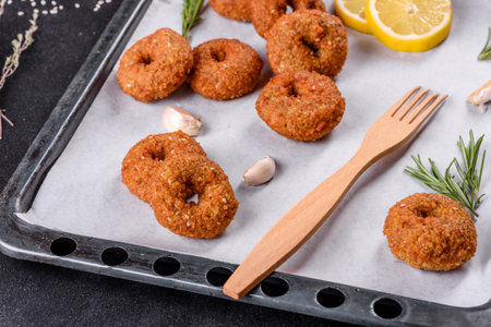 Beautiful delicious fresh chickpea falafel with sauces on a concrete background. Elements of Vegitarian Cuisineの写真素材