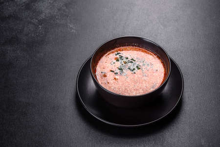Tasty fresh spicy Malaysia soup tom yam with tomato. Asian cuisineの写真素材