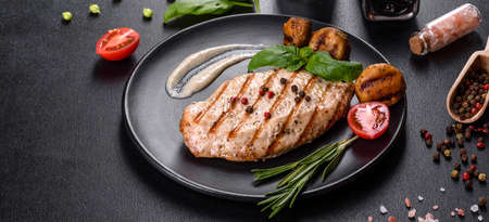 Tasty baked beef steak with vegetables and spices. Grilled dishの写真素材