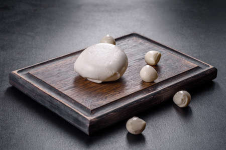 Tasty fresh mozzarella cheese for making caprese salad. Mediterranean foodの写真素材