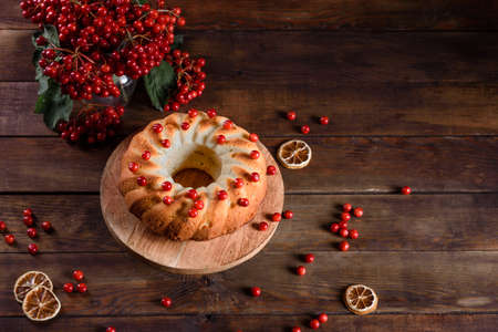 Christmas festive pound cake decorated with cranberries, view from aboveの写真素材