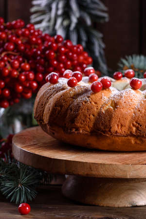 Christmas festive pound cake decorated with cranberries, view from aboveの写真素材