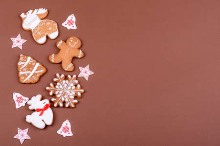Christmas festive ginger gingerbread made at home on a color background. Preparations for the New...
