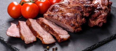 Closeup view of delicious grilled beef medallions served on tableの写真素材