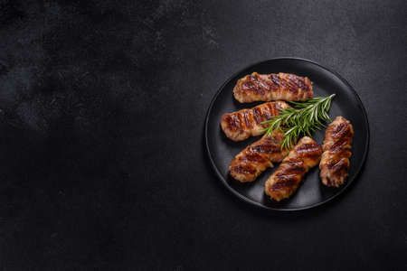 A delicious dish of pork mince wrapped with delicious pieces of bacon. Preparation of chevapchichi