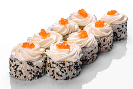 Traditional delicious fresh sushi roll set on a white background with reflection