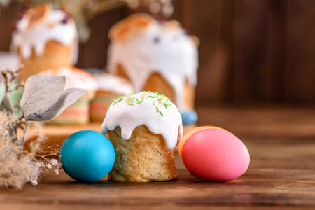 Easter cake and Easter eggs festive celebration table setting traditional decoration and treatsの写真素材