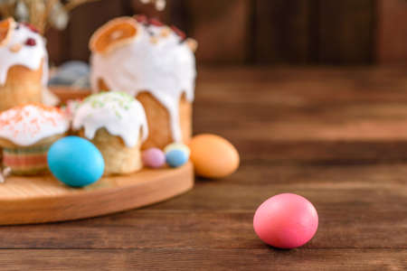 Easter cake and Easter eggs festive celebration table setting traditional decoration and treatsの写真素材