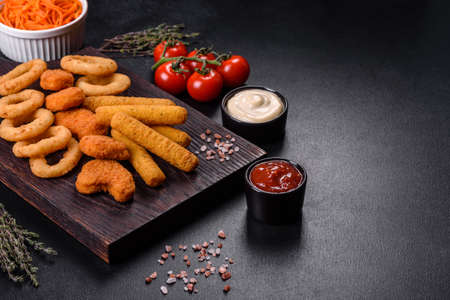 Large beer set of french fries, chicken nuggets and onion ringsの写真素材