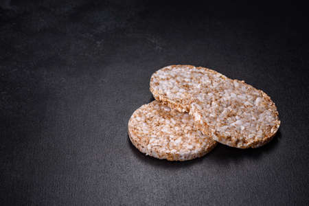 Round Crisp Healthy Gluten Free Buckwheat Crispbread on dark Backgroundの写真素材