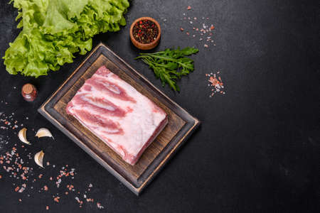 Close-up fat Salted lard homemade lard on a wooden board. Natural product from organic farmの写真素材