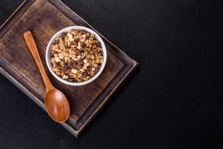 Closeup of oatmeal, corn flakes and wheat stems.Ripe cereal for breakfastの写真素材
