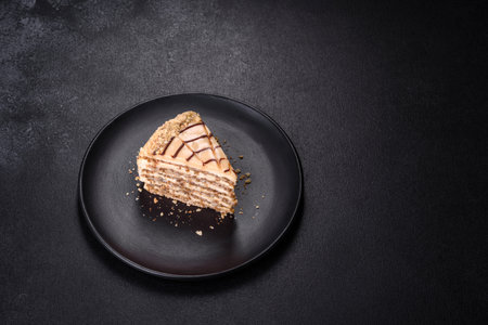 Traditional Hungarian Esterhazy cake, torte. Black background. Copy spaceの写真素材