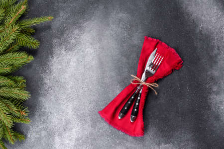 Gingerbread, Christmas tree decorations, dried citrus fruits on a gray concrete background to...
