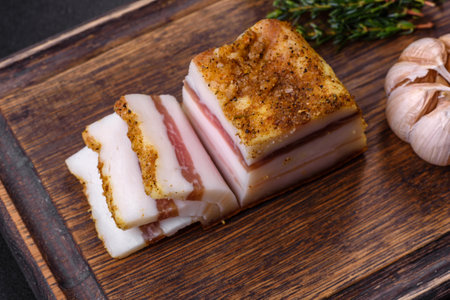 Salted Lard, Raw Pork with Spices on Wooden Cutting Board Studio Photoの写真素材