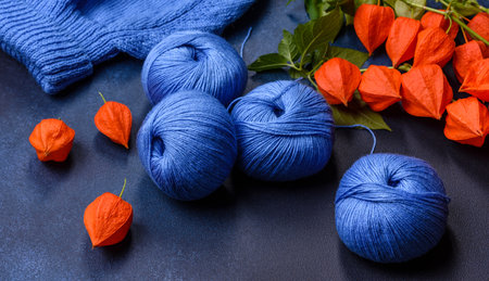 Children's blouse tied with their own hands from blue woolen threads. Home needlework, hobby