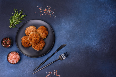 Delicious fresh ground beef patties with onions in breadcrumbs. Meat dish for home dinnerの写真素材