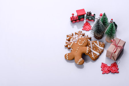 Elements of Christmas scenery, toys, gingerbread and other Christmas tree decorations on a white...